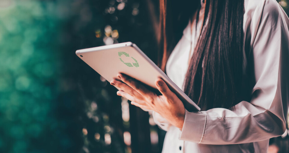 Young businessmen analyze Environmental protection business to meet goals set over blurred Nature background .Film tones and Light fair. select focus