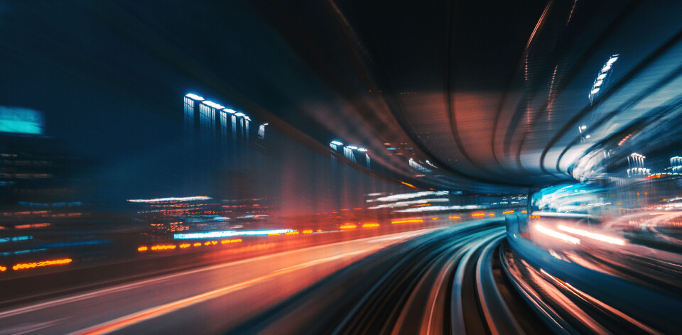 High Speed Motion Blur driving through a tunnel at night Futuristic High Speed Monorail TrainTokyo, Japan
