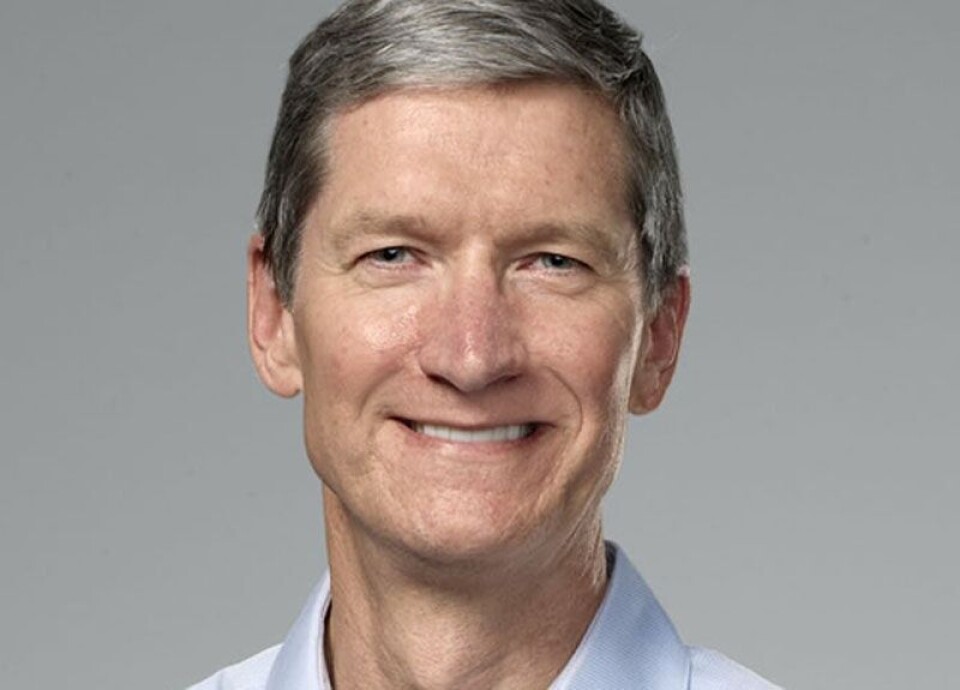 HÅVER INN: Apples toppsjef Tim Cook og Apple håver inn penger.