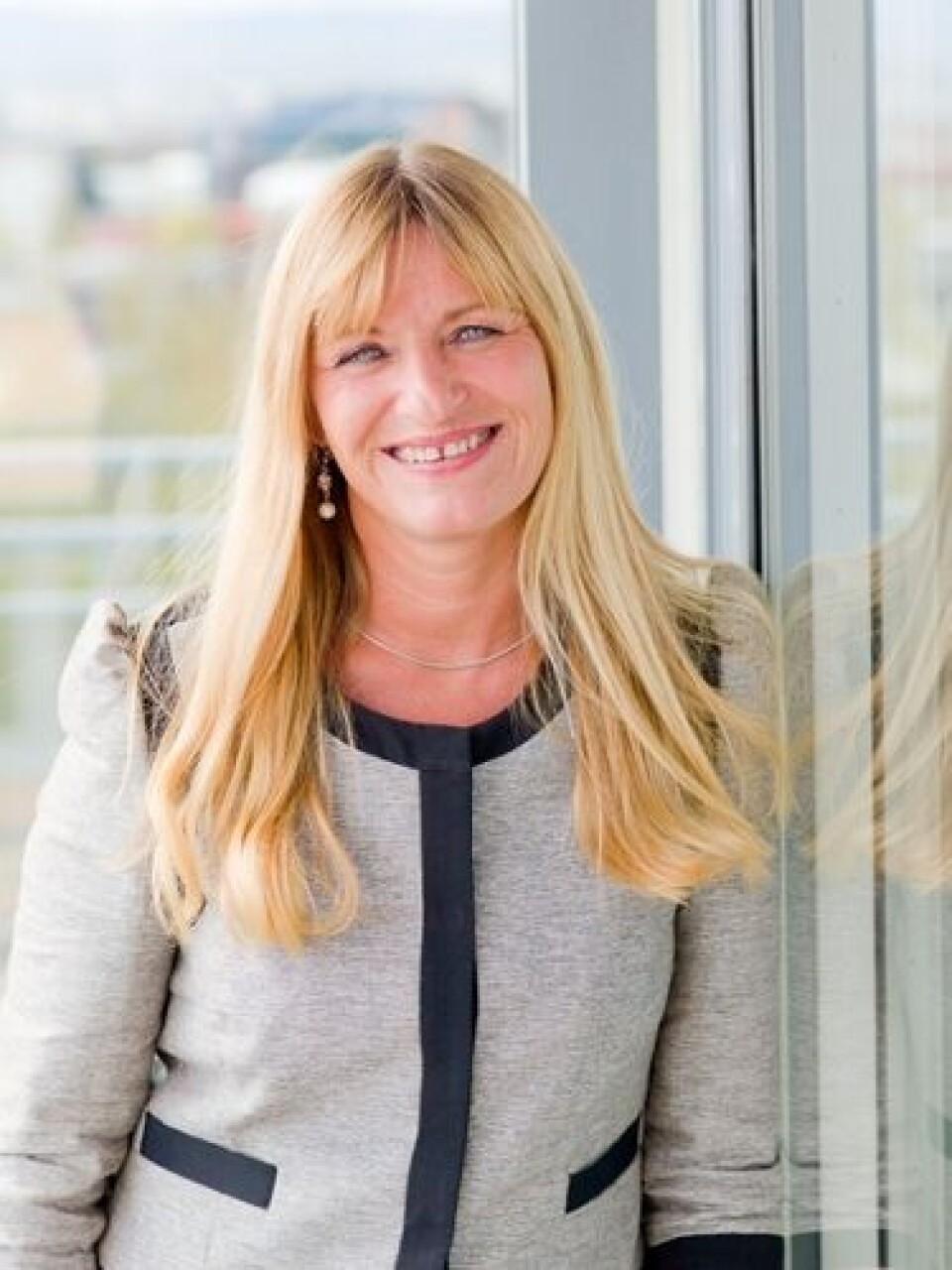 KAPRING PÅ GRENSEN: 99x vant kontraktene om å levere IT-tjenester fra nettskyen til det nye IT-samarbeidet mellom Halden og Aremark kommuner i Østfold, forteller en fornøydAnne-Grethe Wåsjø, salgsdirektør i 99x. Foto: Pressefoto 99x