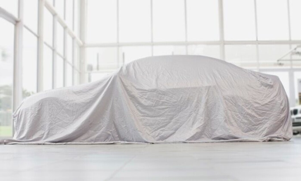 APPLE CAR: Hva skjuler seg bak forhenget? (Foto: Zero Creatives/Getty Images) APPLE CAR: Hva skjuler seg bak forhenget? (Foto: Zero Creatives/Getty Images)